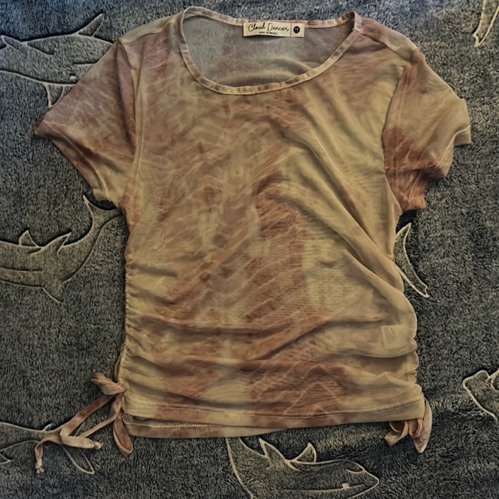 See through snake skin print pink cream colored shirt ruching on both sides.